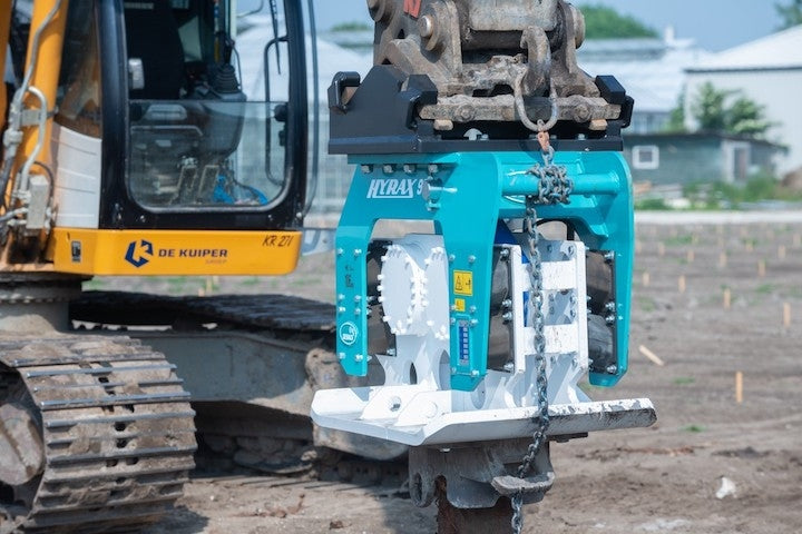 Planche vibrante compacteur Dehaco sur pelleteuse